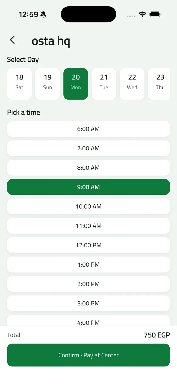 Osta booking screen: choosing a day and an hourly time slot, with the total and a Pay at Center button